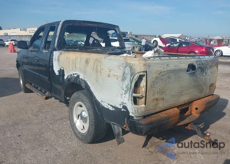 1999 Ford F-150 из США, поврежденный, VIN 1FTRX18WXXNB00041